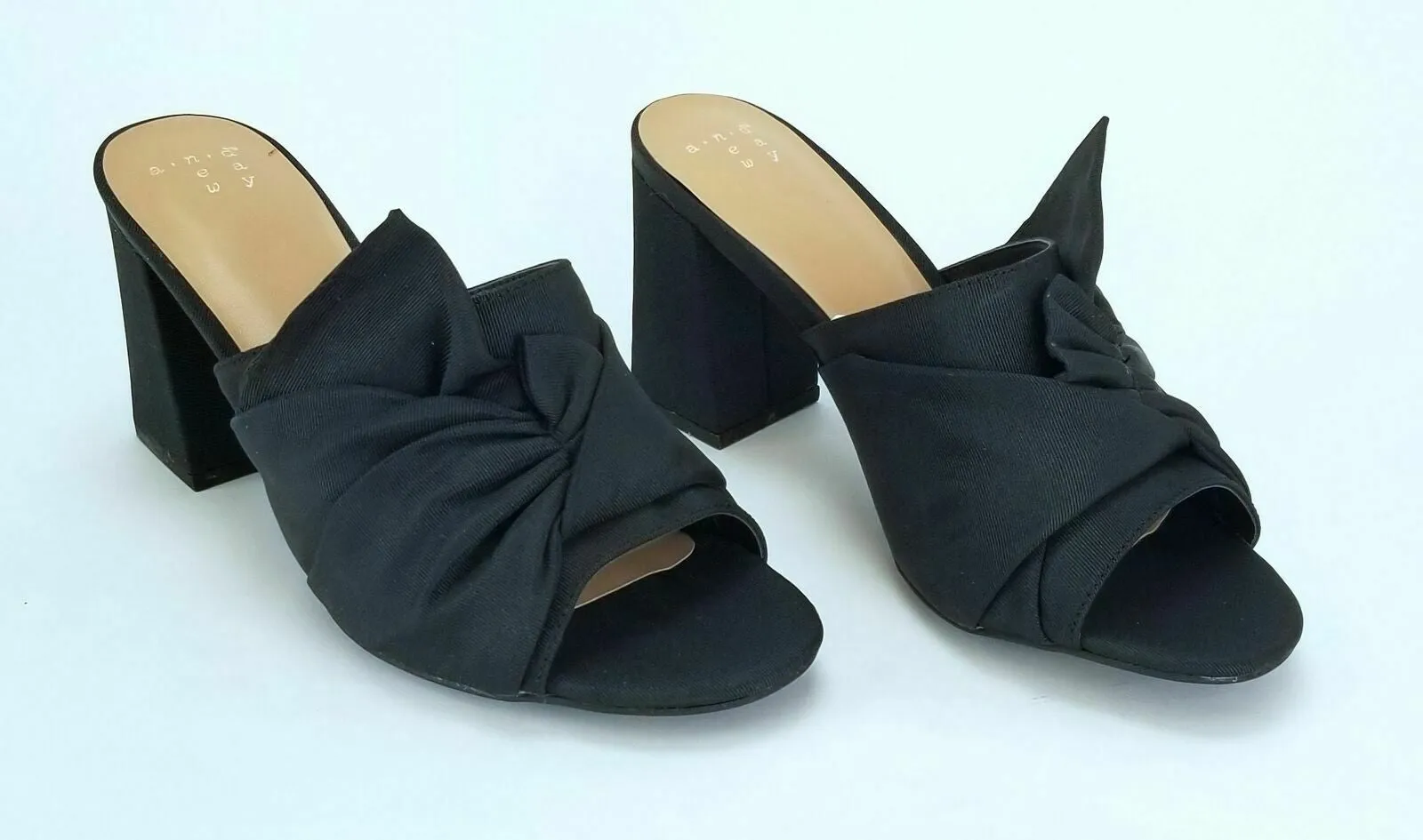 <p><strong>A New Day Women's Knotted Bow Mule Heel Pumps - Black - Size 6.5</strong></p>